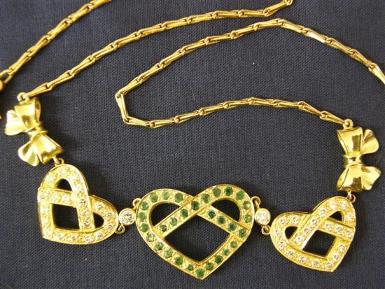 Appraisal: Emerald and diamond triple heart motif necklace testing as ct