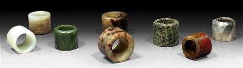 Appraisal: EIGHT ARCHERY THUMB RINGS China Qing-dynasty H - cm Jade