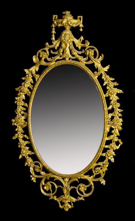 Appraisal: A GEORGE III CARTON PIERRE MIRROR the oval plate in