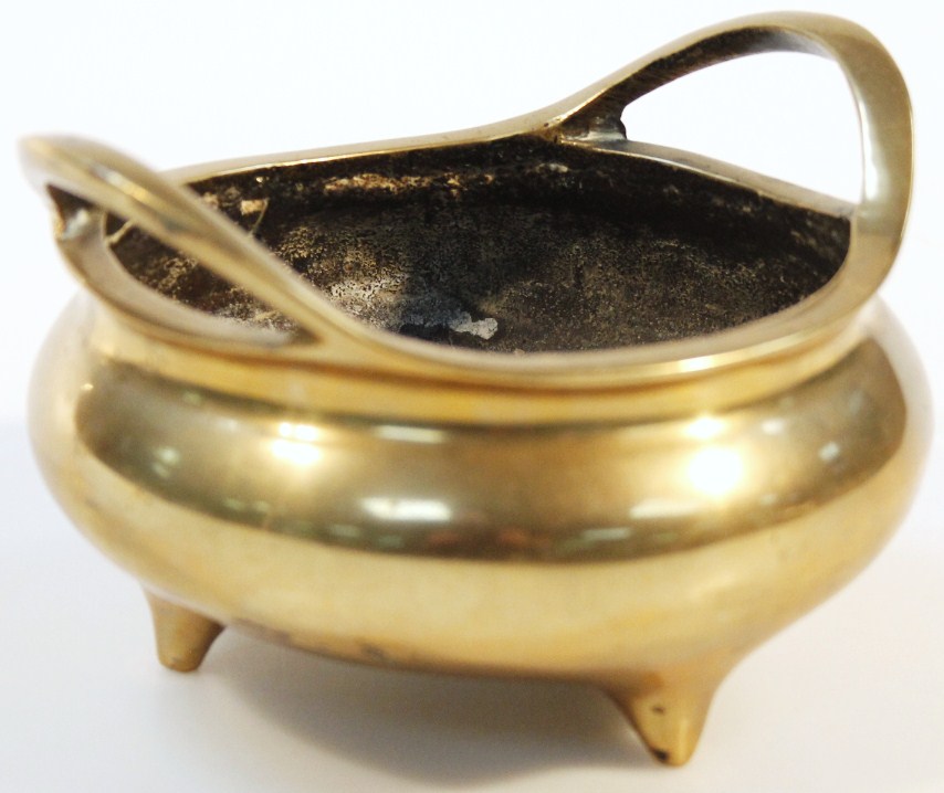 Appraisal: A Chinese bronze censer gilt highlighted of bellied circular form