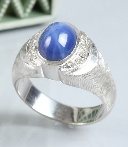 Appraisal: KW gold blue stone and diamond ring stamped K Synthetic