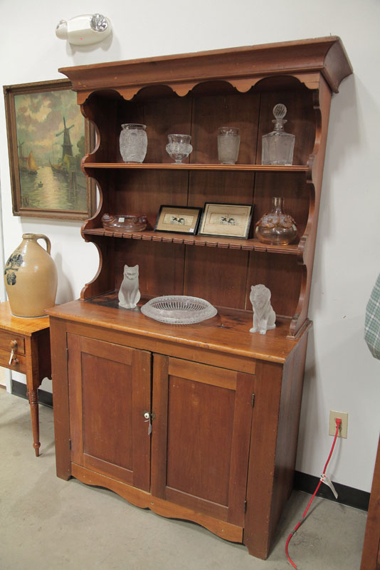 Appraisal: PEWTER CUPBOARD Cherry nail constructed cupboard having a molded cornice