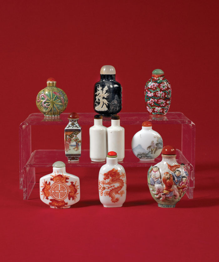 Appraisal: NINE CHINESE ENAMELED OVERLAY AND CARVED GLASS PORCELAIN AND GLASS