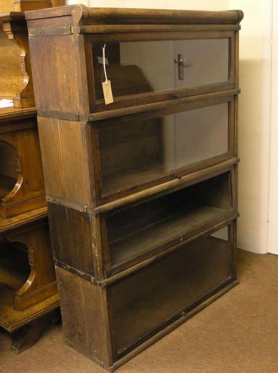 Appraisal: A Globe Wernicke oak sectional bookcase four glazed sections ft