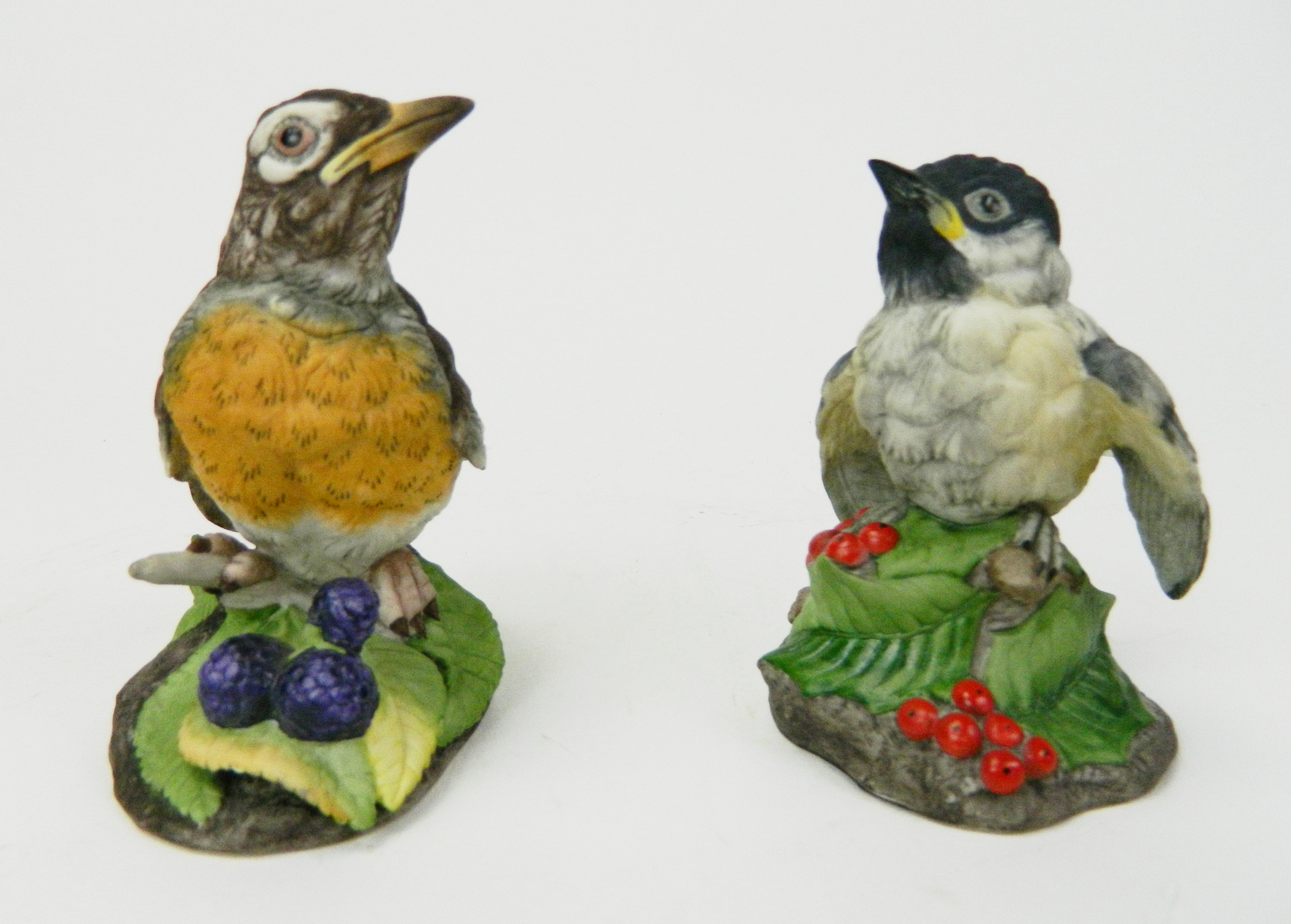 Appraisal: Edward Boehm porcelain bird figurines ''Fledging Robin'' - ''h ''Fledging