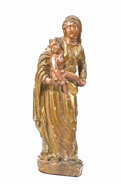 Appraisal: A Continental carved polychrome and giltwood figure of the Madonna