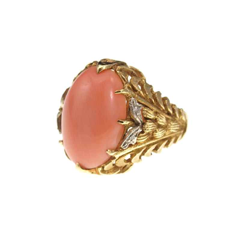 Appraisal: K CORAL AND DIAMOND RING An Italian K yellow gold