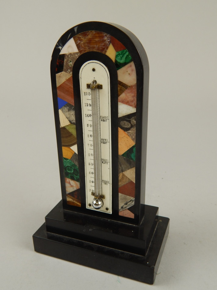 Appraisal: An early thC black slate and specimen stone table thermometer