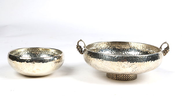 Appraisal: A CONTINENTAL SILVER BOWL with a hand beaten finish and