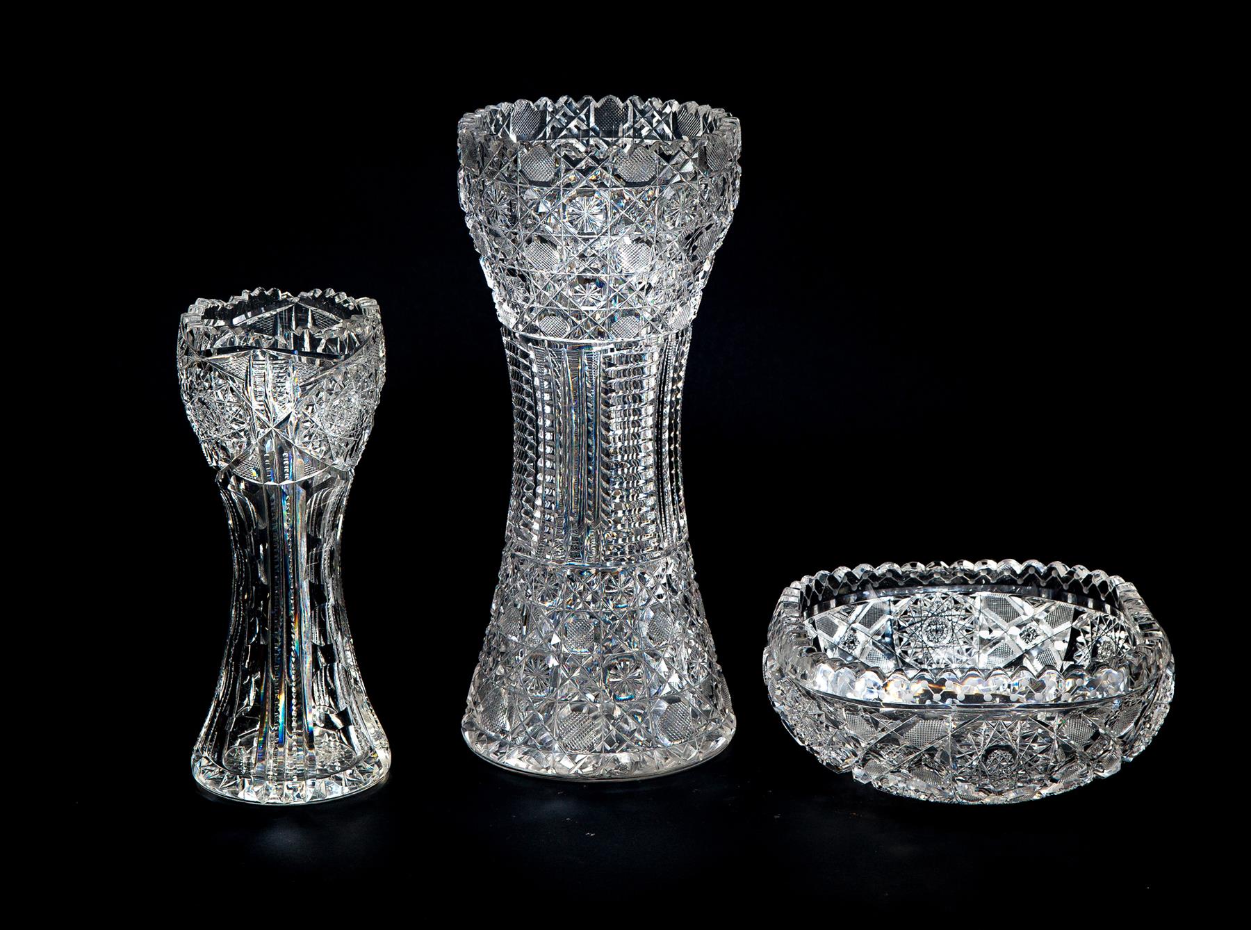 Appraisal: THREE PIECES OF CUT GLASS American th century Two vases