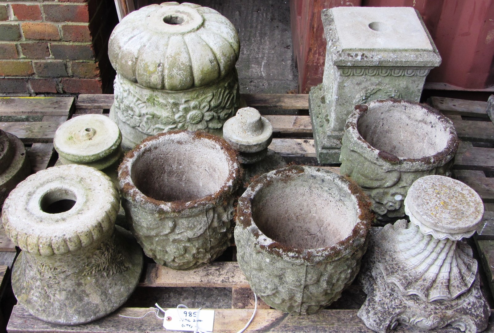 Appraisal: A pallet of various reconstituted stone urns planters and pedestals