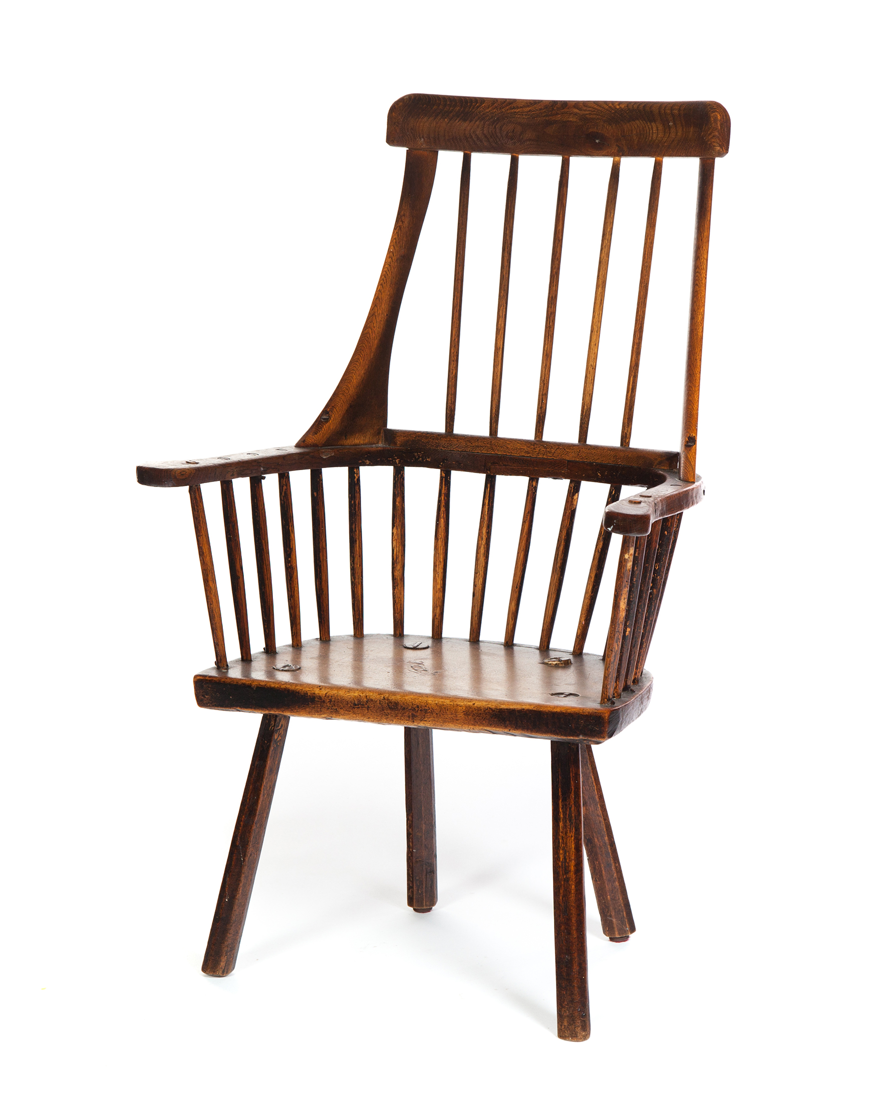 Appraisal: WELSH WINDSOR ARMCHAIR Nineteenth century mixed woods Shaped arms and