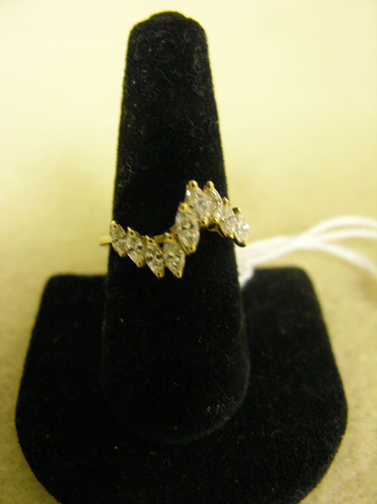 Appraisal: MARQUISE CUT DIAMOND RING Marquise cut diamond waved bad Diamond