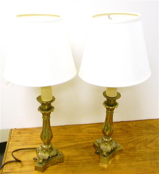 Appraisal: Pair of brass candle lamps shaped triangular base with footed