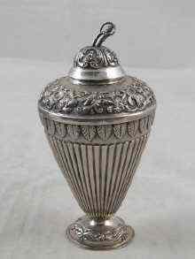 Appraisal: A Dutch silver caddy or blind caster of ribbed tapered