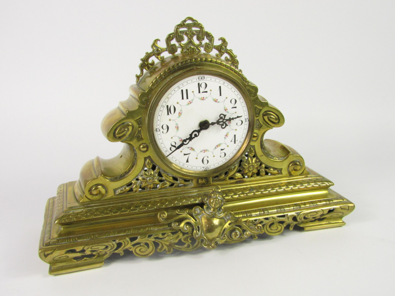 Appraisal: A French brass cased mantel clock enamel dial bearing Arabic