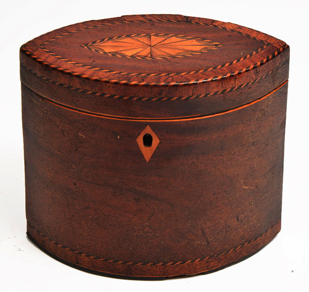 Appraisal: A GEORGE III MAHOGANY NAVETTE SHAPED TEA CADDY with satinwood