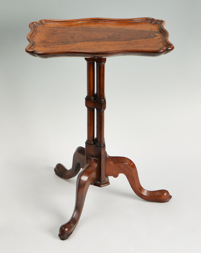 Appraisal: CHIPPENDALE STYLE DIMINUTIVE ROSEWOOD CANDLE STAND Possibly Philadelphia sculpted top