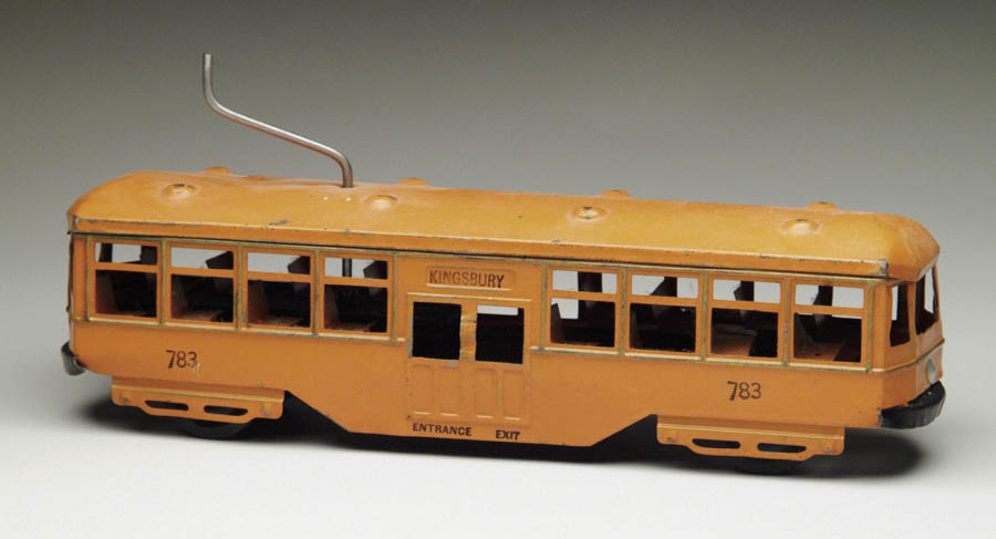 Appraisal: KINGBURY CLOCKWORK TROLLEY CAR Trolley car is painted orange with