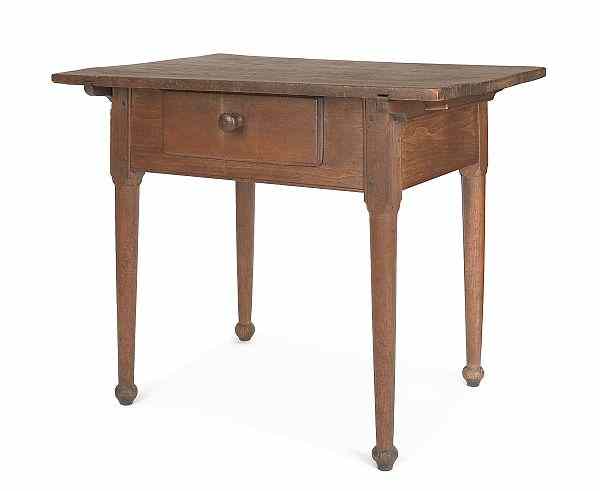 Appraisal: Pennsylvania walnut tavern table late th c with a lift