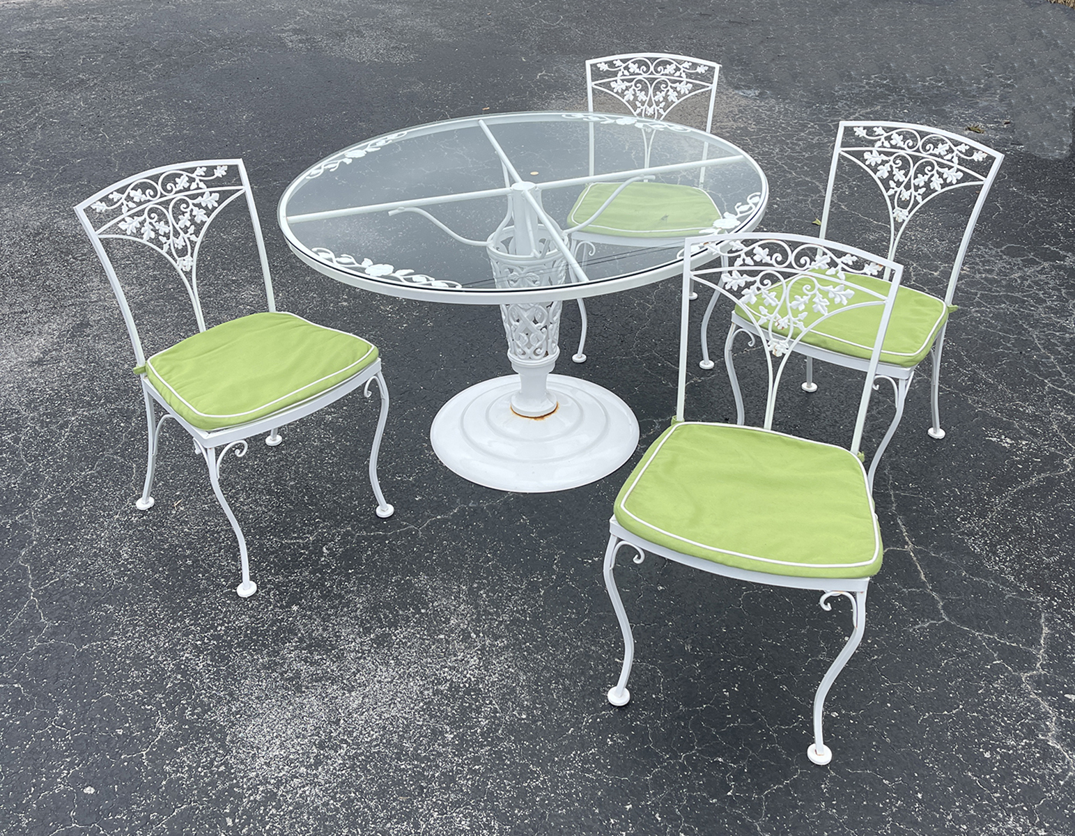 Appraisal: PC WOODARD WROUGHT IRON GLASS-TOP TABLE CHAIRS Comprising - Round