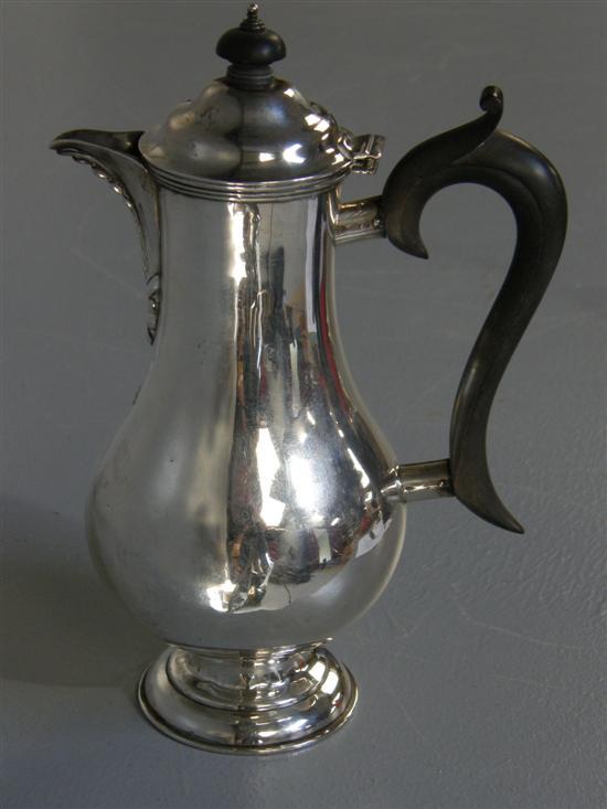 Appraisal: George VI silver hot water jug with ebonised handle London