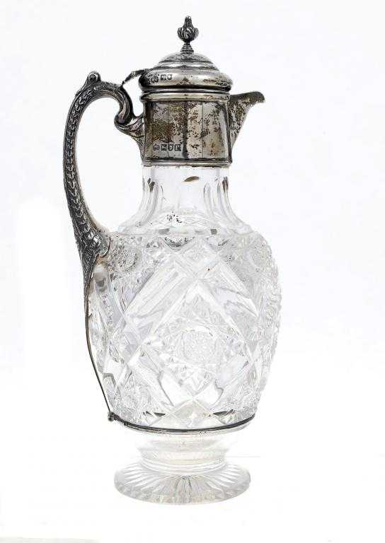 Appraisal: A GEORGE V SILVER MOUNTED CUT GLASS CLARET JUG with