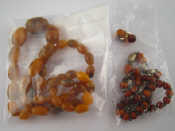 Appraisal: A graduated amber beaded necklace approx gms largest bead approx