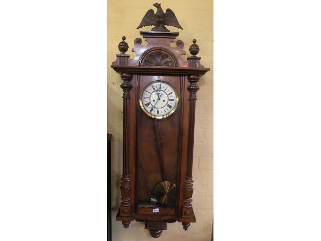 Appraisal: A thC Vienna wall clock the walnut case mounted with