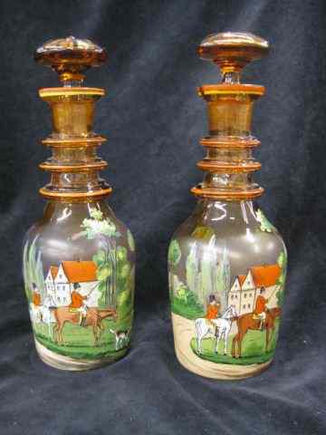 Appraisal: Pair of Enameled Art Glass Decanterswith fox hunt scenes made