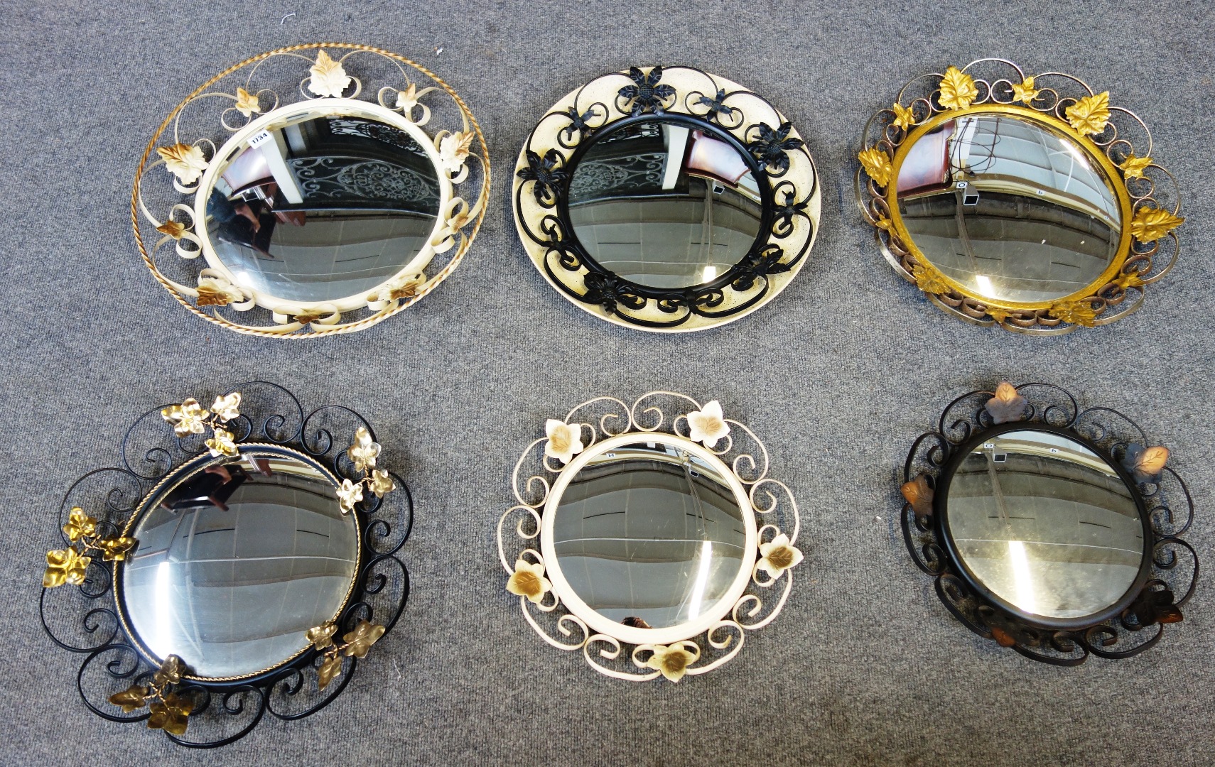 Appraisal: A group of twelve various th century convex mirrors in