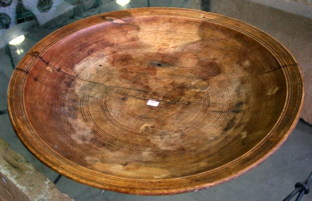 Appraisal: An African round wooden bowl carved from a single piece