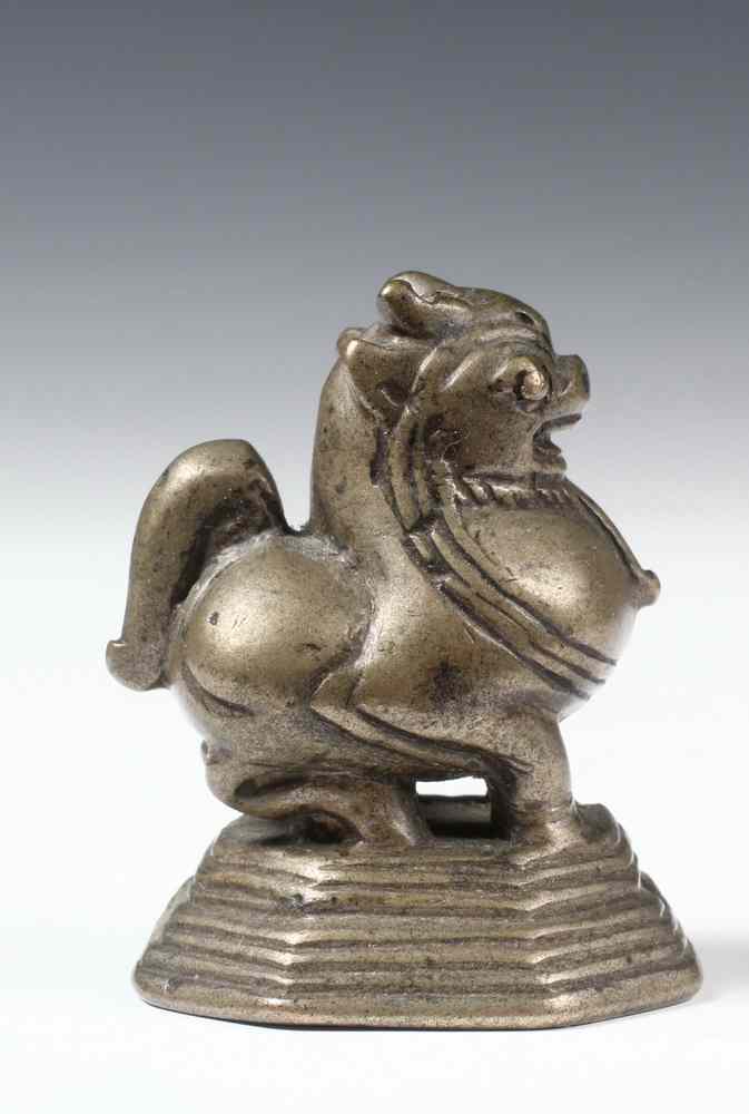 Appraisal: SMALL CHINESE PAKTONG WEIGHT IN THE FORM OF A QILIN