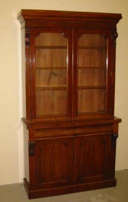 Appraisal: A VICTORIAN MAHOGANY TWO STAGE BOOKCASE the adjustable shelving enclosed