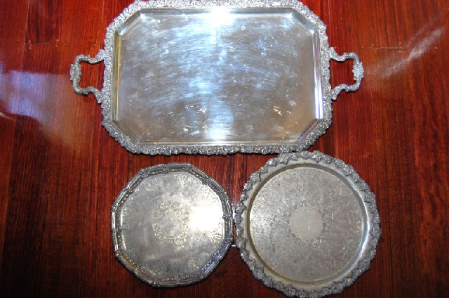 Appraisal: A GROUP OF TWELVE SILVER PLATE TRAYS