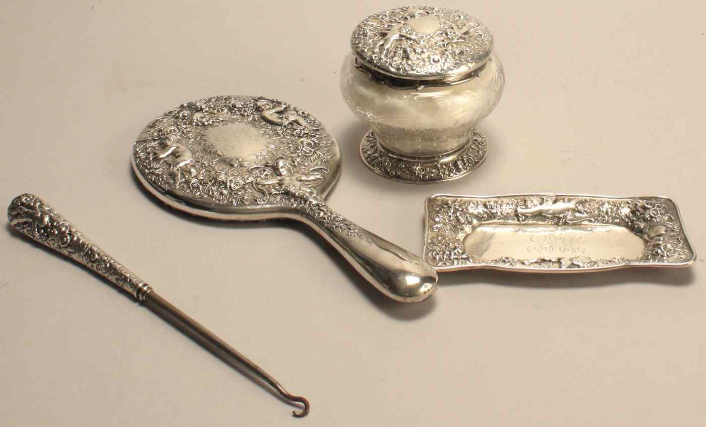 Appraisal: GORHAM STERLING SILVER PARTIAL DRESSER SET th CenturyIn ornate repouss