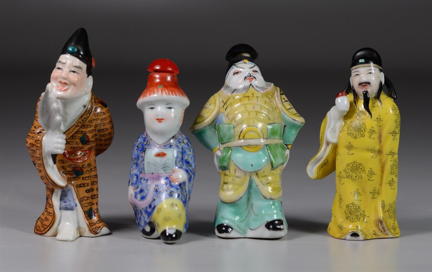 Appraisal: Figural porcelain Chinese snuff bottles one signed tallest