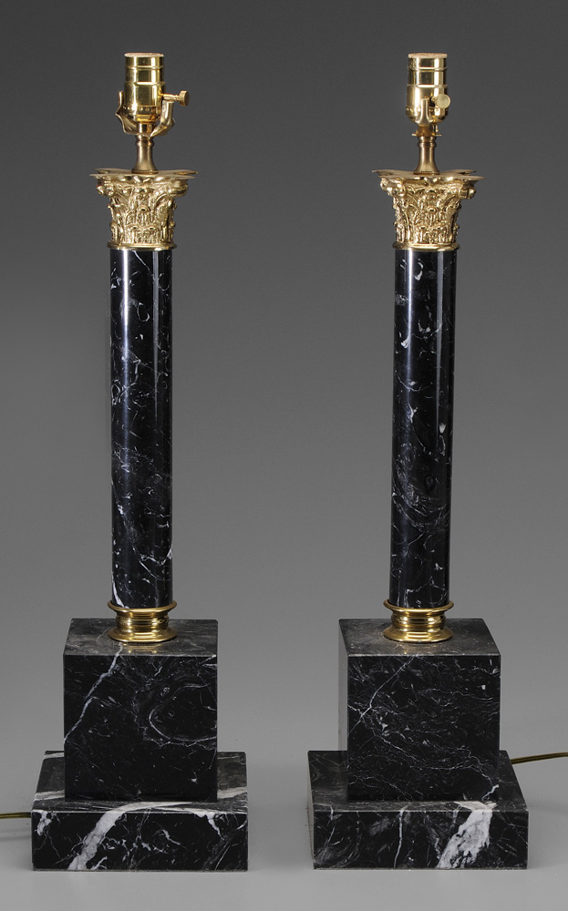 Appraisal: Pair Marble Lamp Bases modern black marble columns mounted on