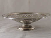 Appraisal: A pierced silver fruit dish on stand cm dia wt