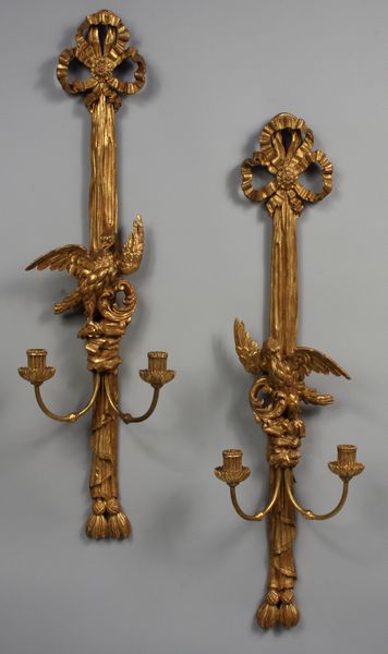 Appraisal: Pair of th th Century carved giltwood sconces with eagles