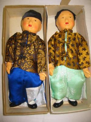 Appraisal: A pair of Chinese composition gentlemen dolls with moulded and