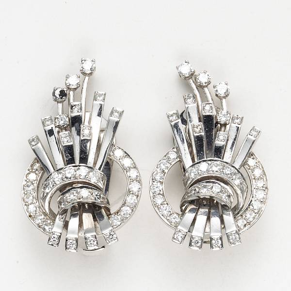 Appraisal: A pair of diamond and fourteen karat white gold spray