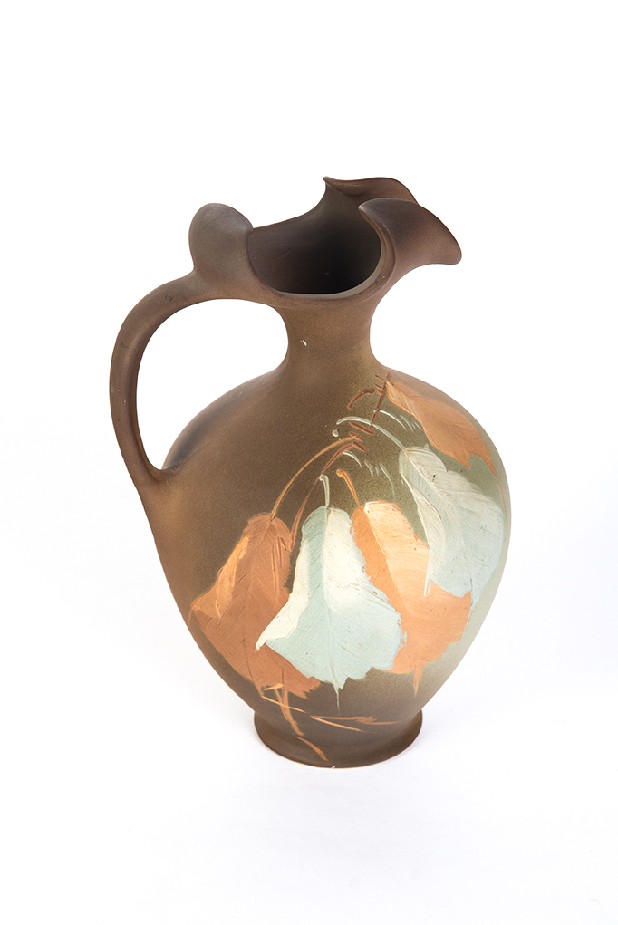 Appraisal: UNUSUAL MATTE GLAZE OWENS ART POTTERY American ca Shaded chocolate