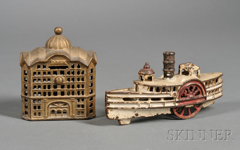 Appraisal: Two Cast Iron Toys late th century white paddle steamer