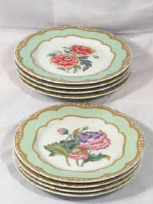 Appraisal: A set of eight tea plates decorated with various fruits