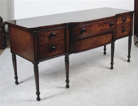 Appraisal: A Regency mahogany and ebony strung sideboard of inverted breakfront