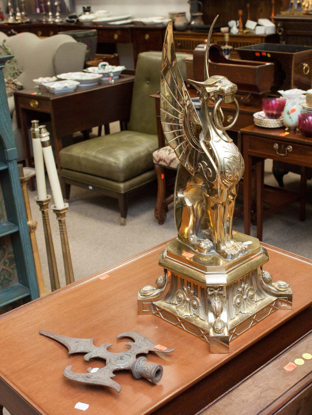 Appraisal: Brass griffin flag holder and flag finial