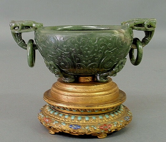 Appraisal: Carved spinach green jade bowl on a gilt decorated metal