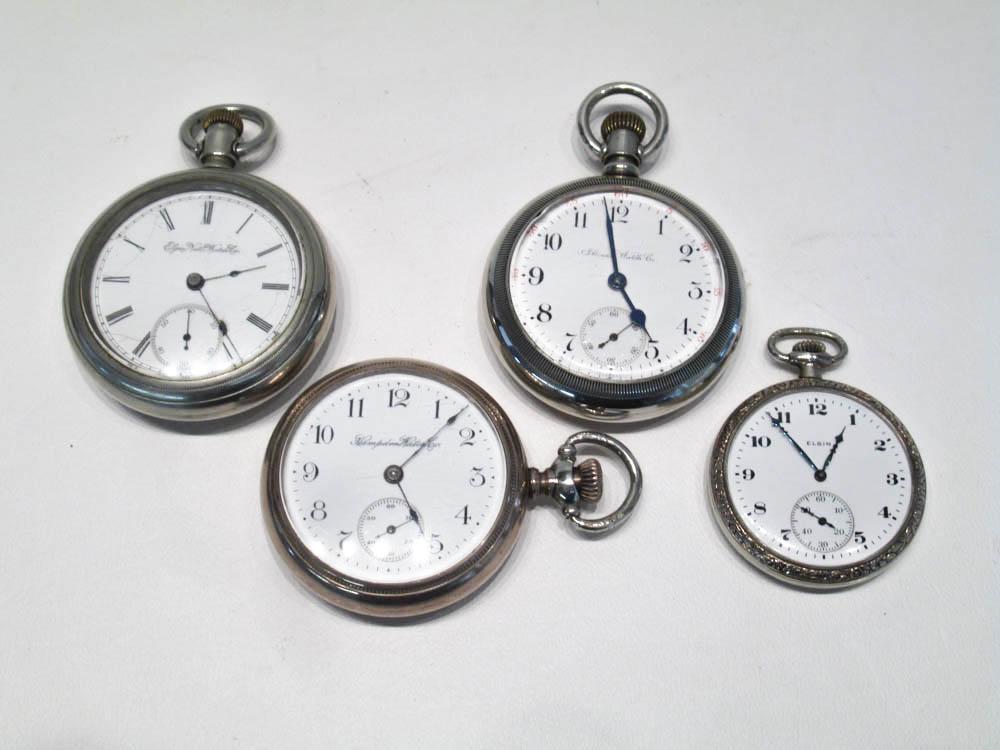 Appraisal: FOUR OPEN FACE POCKET WATCHES Hampden Watch Co model Hayward