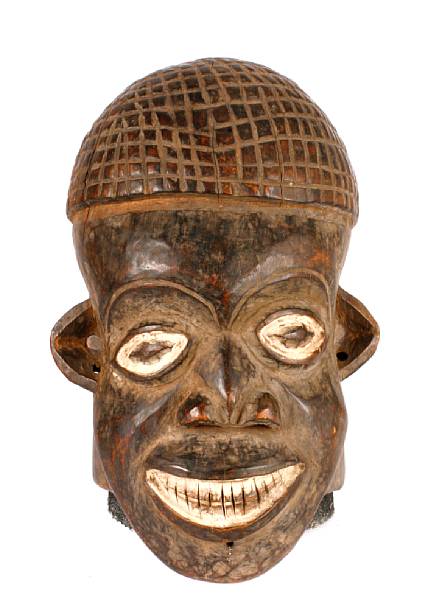 Appraisal: Two Cameroon dance masks The first a classical male cap